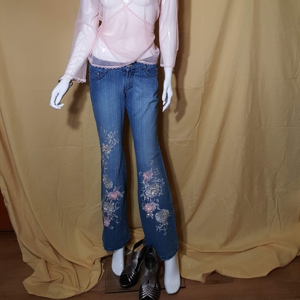 Jeans with applique, sequence, embroidery.